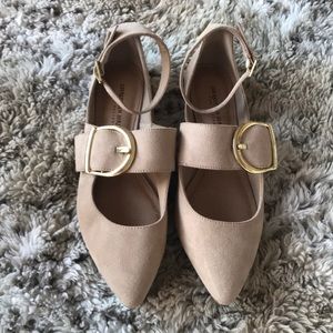 Trendy nude buckle flats